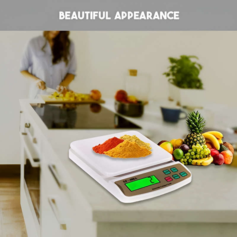 This image features a digital kitchen scale with an LCD display, placed in a modern kitchen setting. The scale is displaying spices on its platform, alongside colorful fruits, suggesting its use for measuring various kitchen ingredients. The words "Beautiful Appearance" are prominently displayed at the top.